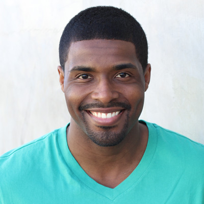 An elderly couple embracing, sharing a joyful moment.